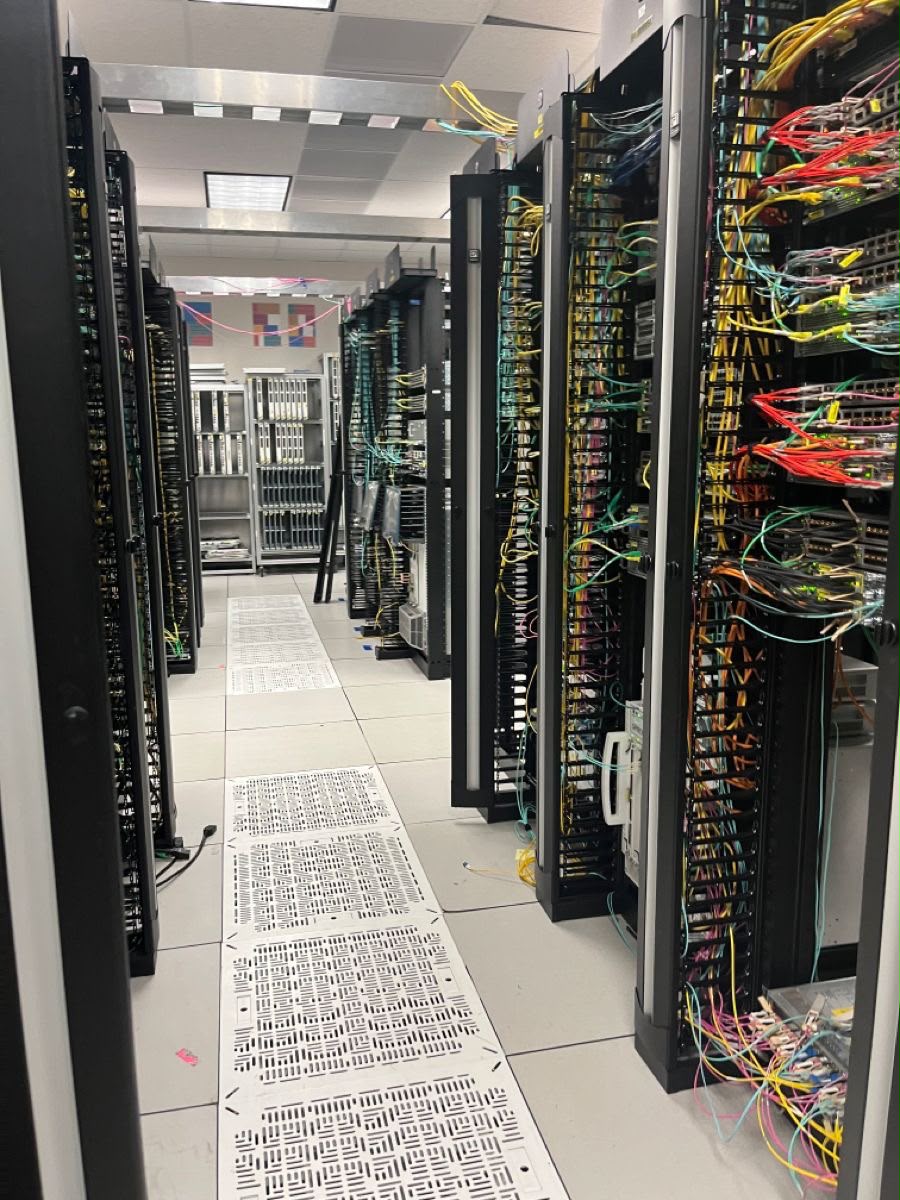 High density fiber plant with multicolor patch cables in a data hall