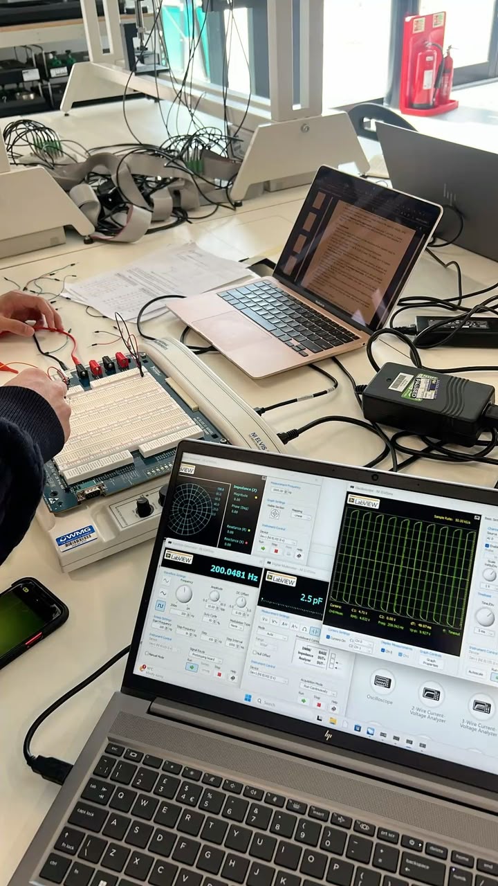 Electronics lab bench with breadboard prototyping and instrumentation software